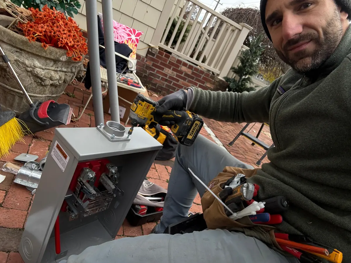 New PSEG-ready exterior meter pan and service entrance riser installed by Rob Berman, weatherproofed and ready for utility inspection.
