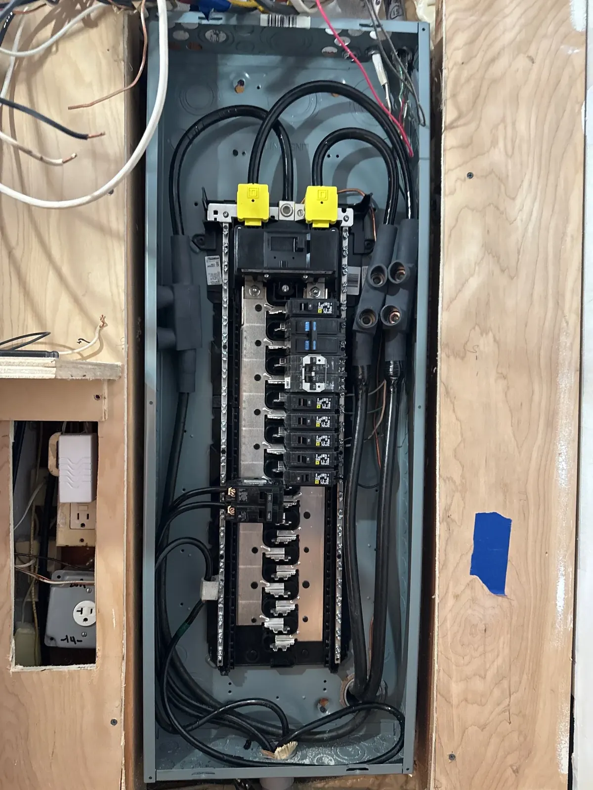 200-amp electrical panel rough-in during new construction on Long Island — clean conductor routing and labeled circuits by Berman Electric.
